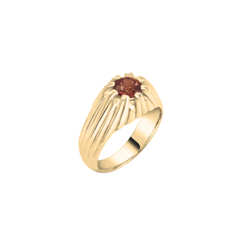 Gold ring with a red gemstone on a white background