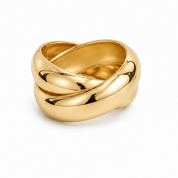 A polished yellow gold ring with a modern, intertwined knot-like design, photographed on a clean white background.