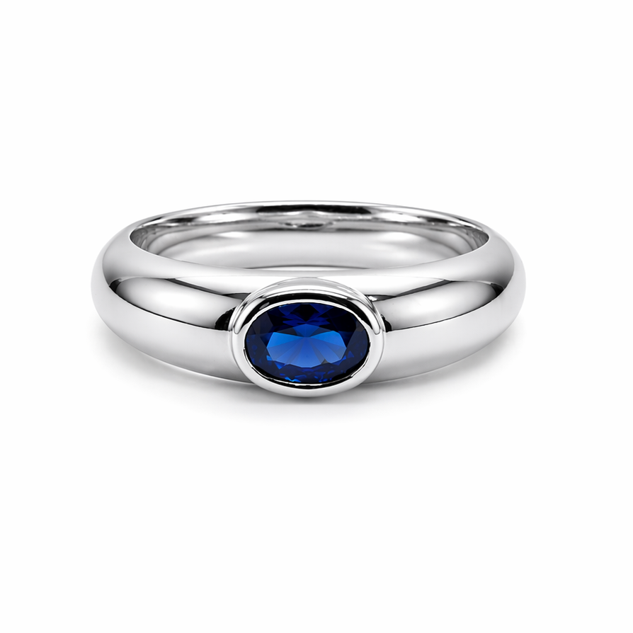 Elegant_silver_ring_with_blue_gemstone.png