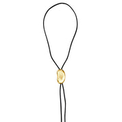 A silver-colored necklace with a smooth, oval-shaped pendant on a black cord.