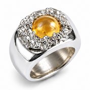 A silver-toned signet ring featuring a large oval yellow gemstone surrounded by a halo of small clear stones, set against a plain white background.