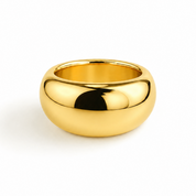 A polished, dome-shaped gold ring with a smooth, reflective surface, shown on a clean white background.