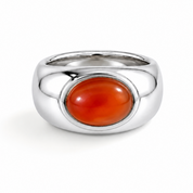 A polished silver ring featuring a smooth, oval-shaped orange cabochon gemstone in a bezel setting, shown on a clean white background.